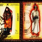 OMAN COSTUME 2 DIFFERENT USED STAMPS #3011
