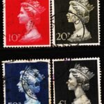 GREAT BRITAIN QUEEN ELIZABETH II 4 DIFFERENT MEDIUM SIZE USED STAMPS #3001